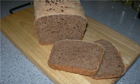 خبز القمح من دقيق ورق الحائط مع عجين الحبوب المتناثرة