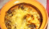 Patates amb bolets en una olla