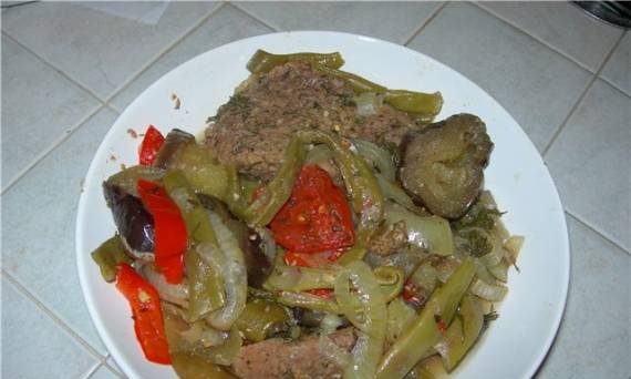 Veal with vegetables in its own juice