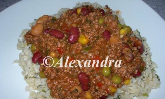 Chili Kon Carne with lean ground beef and 100% dark chocolate on a herb whole grain rice pad