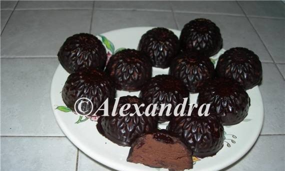 Chocolate glazed sweets with "Dahlia" cherry truffle filling
