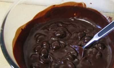 Cherry jam in chocolate with cognac