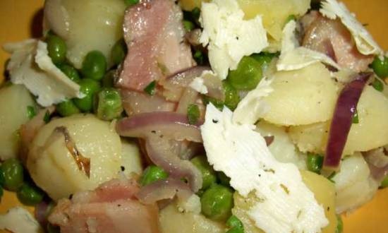 Potatoes with bacon, green peas, cheese