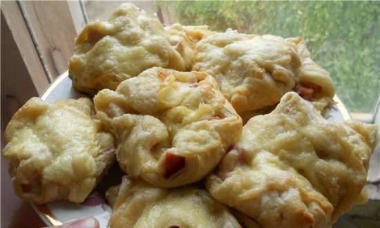 Puff pastries with frozen cherries in the oven
