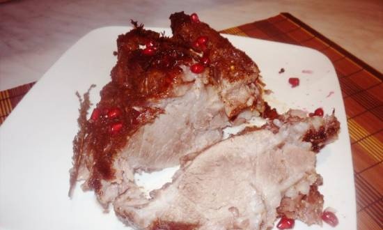 Baked pork in a spicy pomegranate sauce