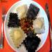 Zwart-witte ravioli met visvulling