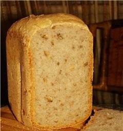 Wheat bread with apple, honey and nuts in a bread maker