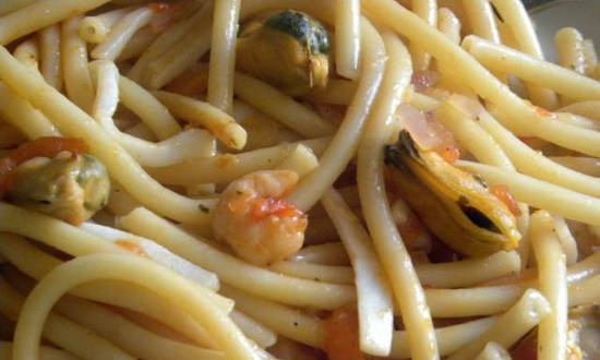 Pasta with seafood in tomato sauce