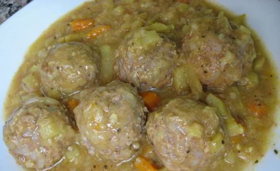 Meatballs with cabbage sauce in a slow cooker