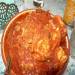 Pickled fish appetizer in tomato sauce