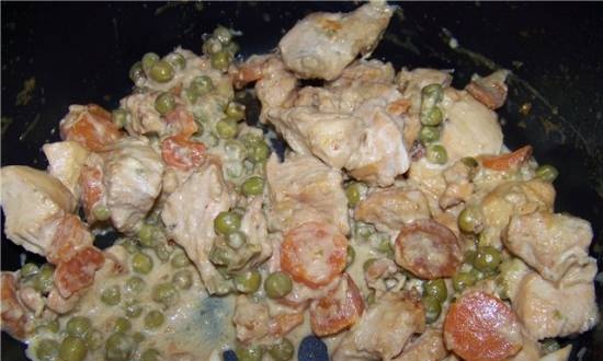 Chicken fillet with carrots and green peas in a slow cooker Moulinex Minute Cook