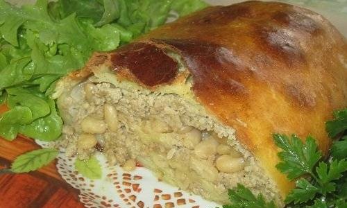 Meatloaf with beans and cabbage in dough