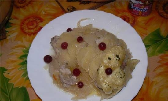Chicken with sauerkraut and potatoes in the oven