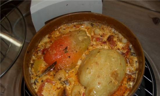Peppers stuffed with meat, vegetables, with creamy sauce