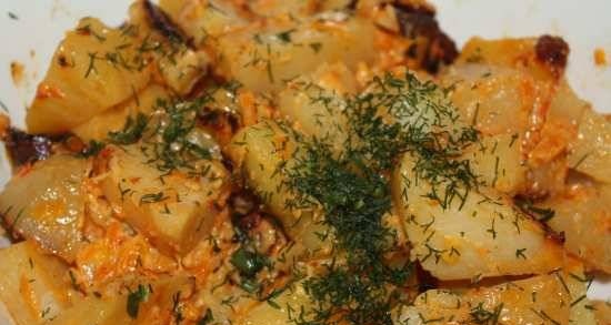 Aardappelen met wortelen gebakken in een romige tomatensaus in de oursson 5005 snelkookpan