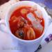 Tomato soup with dumplings and sea creatures