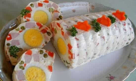 Festive jelly salad with vegetables, ham and egg