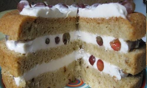 Sponge cake with light sour cream and grapes in a Panasonic multicooker