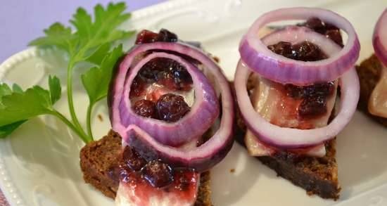 Herring appetizer with spicy cranberry sauce