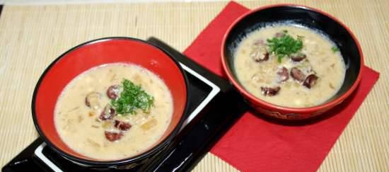 Bavarian beer soup with cheese and smoked sausages