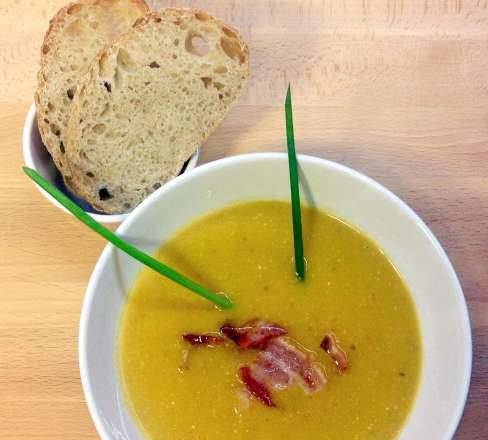 Pumpkin soup with pistachios and bacon