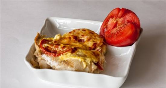 Hake baked with tomatoes and cheese in the Princess pizza maker