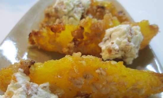 Orange wedges in oatmeal with curd cheese
