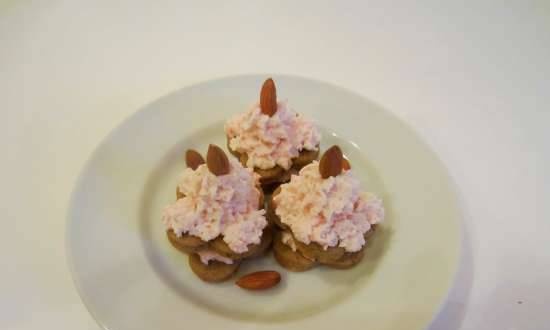 Almond and fish cookies with crab cream