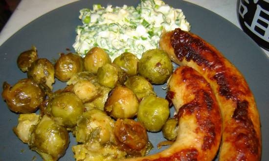 Fried sausages with Brussels sprouts in a Panasonic SR-TMH 18 multicooker