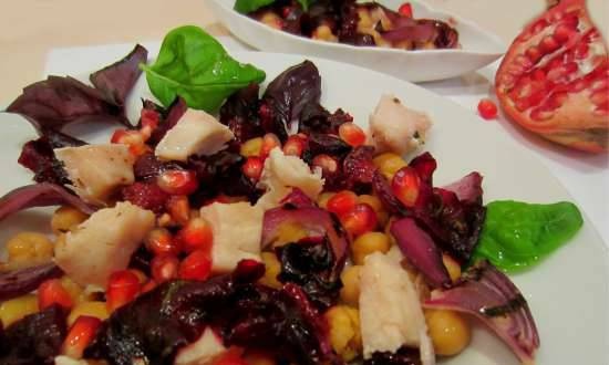 Warme salade van kikkererwten, zongedroogde pruimen, bieten en gegrilde rode uien