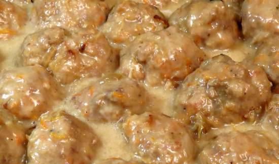 Meat and vegetable meatballs in cheese sauce