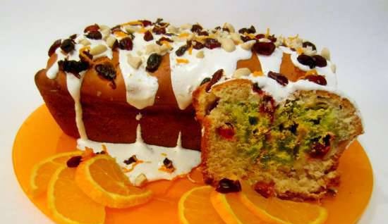 Orange-cranberry muffin under glaze with cranberries and nuts
