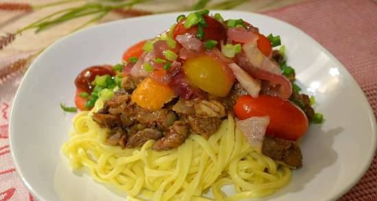 Pasta with meat, liver, fresh cherry tomatoes and pickled red onions