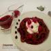Chocolate noodles with berry sauce