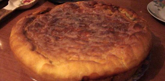 Pie with canned saury and potatoes in the Princess 115000 pizza maker