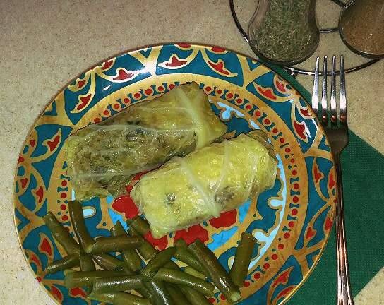 Savoy cabbage cabbage rolls with celery on a green bean pillow in a multicooker Redmond RMC-M 4502