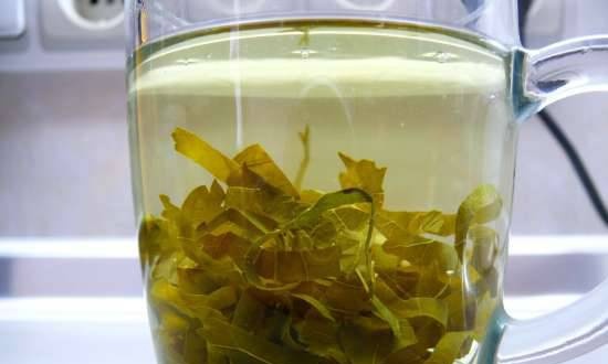 Green tea from the leaves of garden and wild plants, dried strawberry tails