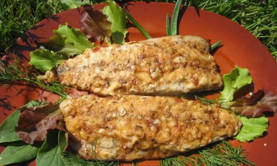 Baked mackerel stuffed with cheese and eggs