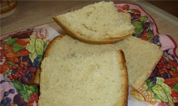Wheat bread on semolina in the oven