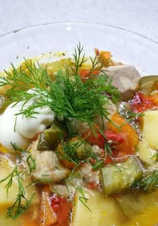 Pot of meat and vegetables with broth