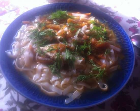 Insalata tiepida con calamari e spaghetti di riso