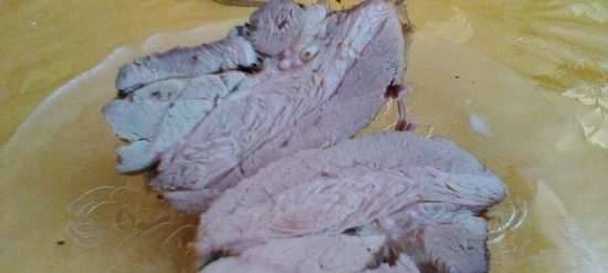 Frozen turkey fillets in a water bath in a slow cooker