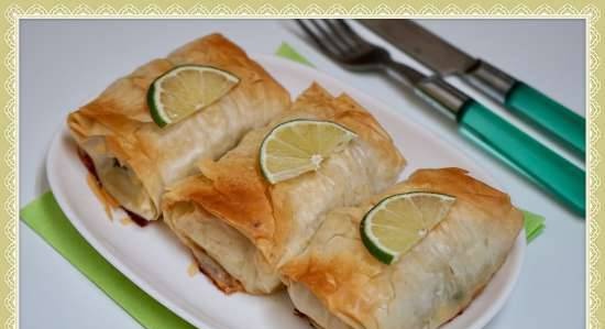 Fillet of fish (pollock) in filo dough diapers, stuffed with herbs, egg and butter in a Princess pizza maker or oven