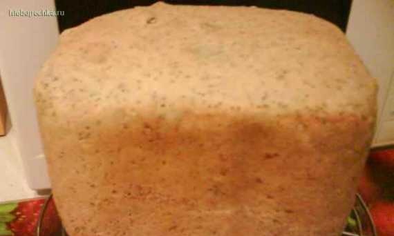 Rye-wheat bread with green onions in the oven