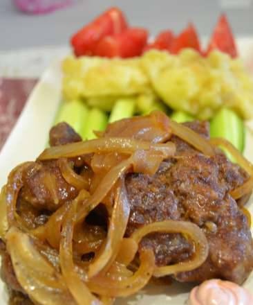 Beef liver chop with baked apple garnish
