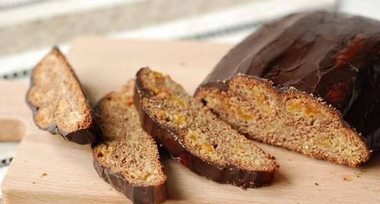 Rolled cake with dried apricots and almonds filling