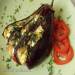 Eggplant baked in the oven with cheese and tomatoes in a different manner