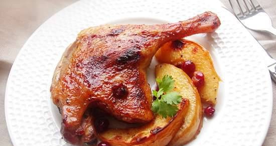 Duck legs baked with cranberries and quince