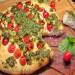 Focaccia with pesto sauce and cherry tomatoes