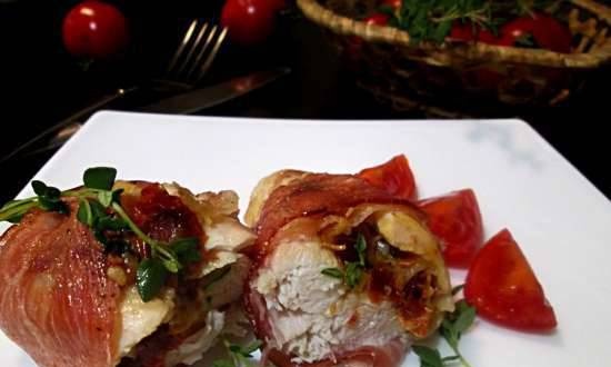 Chicken breasts in bacon stuffed with garlic, thyme and sun-dried tomatoes
